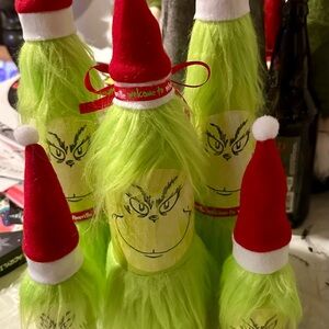 Grinch-Themed Christmas Bottles with Santa Hats